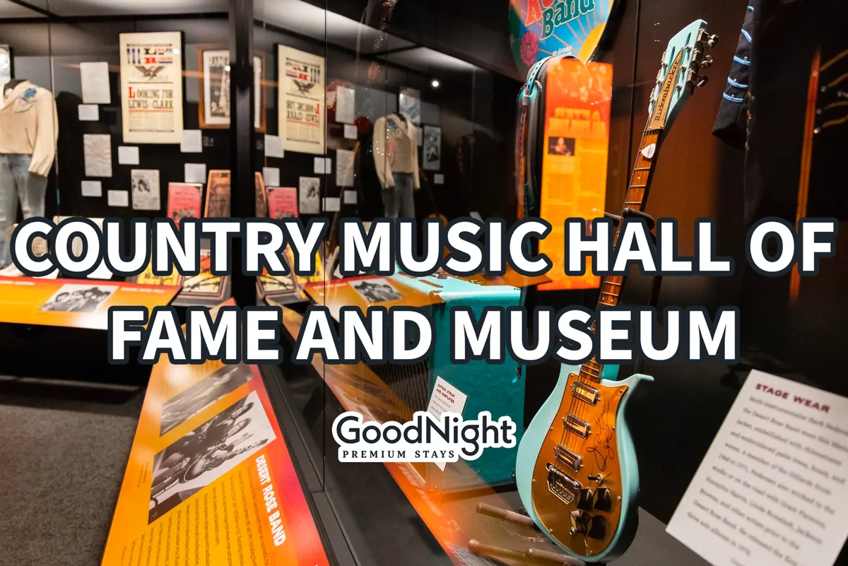 An interior museum exhibit brimming with country music heritage: a guitar, stage wear displays, and historical posters invite visitors to learn and celebrate Nashville’s musical roots. The celebratory atmosphere is vibrant and educational.